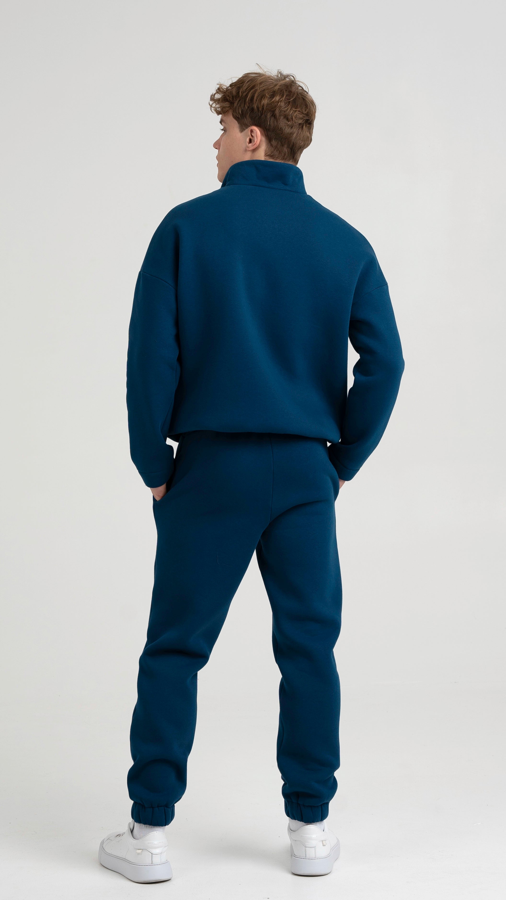 Stilingas mėlynas vyriškas treningų komplektas su užsegimu ant kaklo