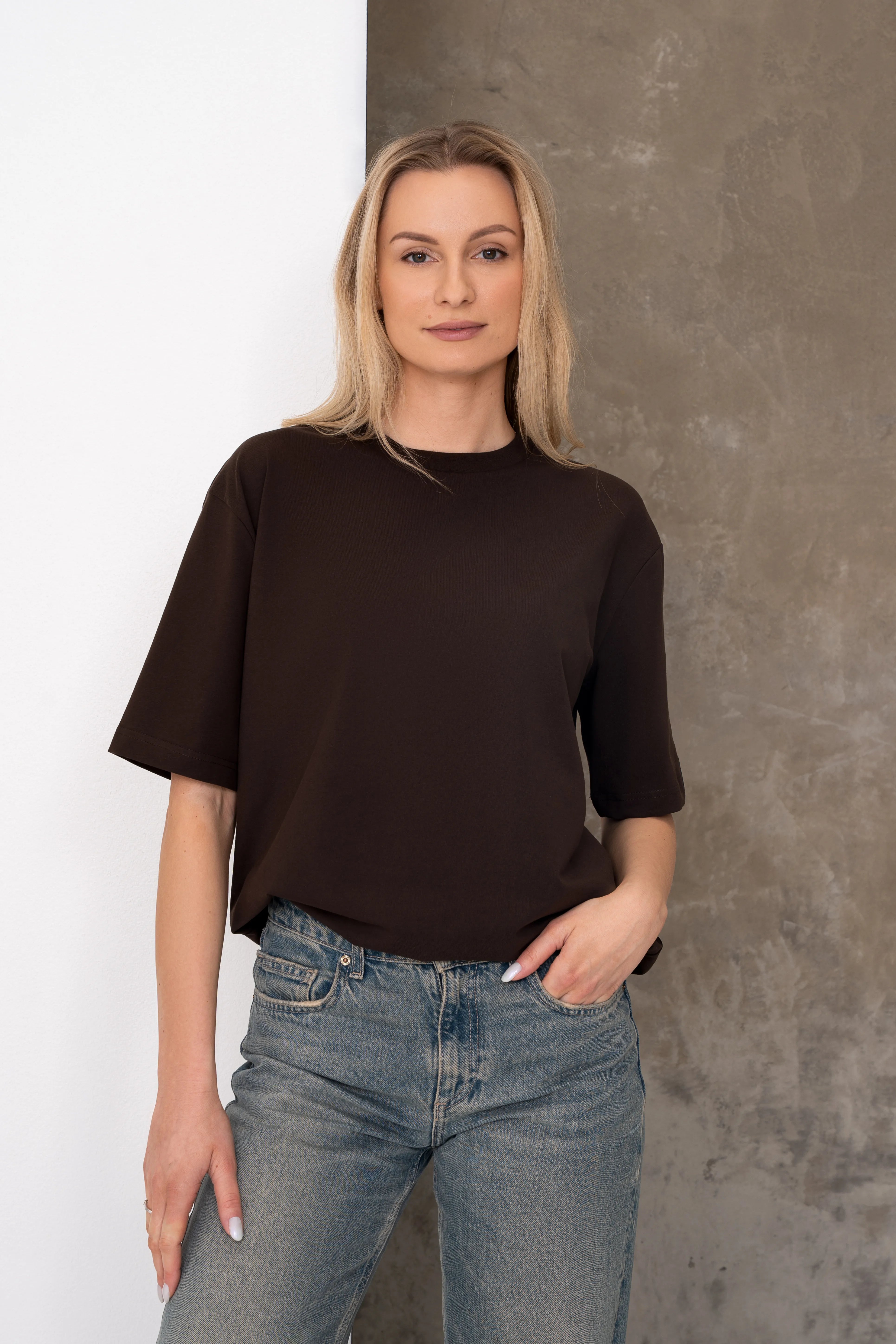 Brown women’s oversized T-shirts with short sleeves, a round neckline, dropped shoulders, and a black cutmyfashion label on the sleeve